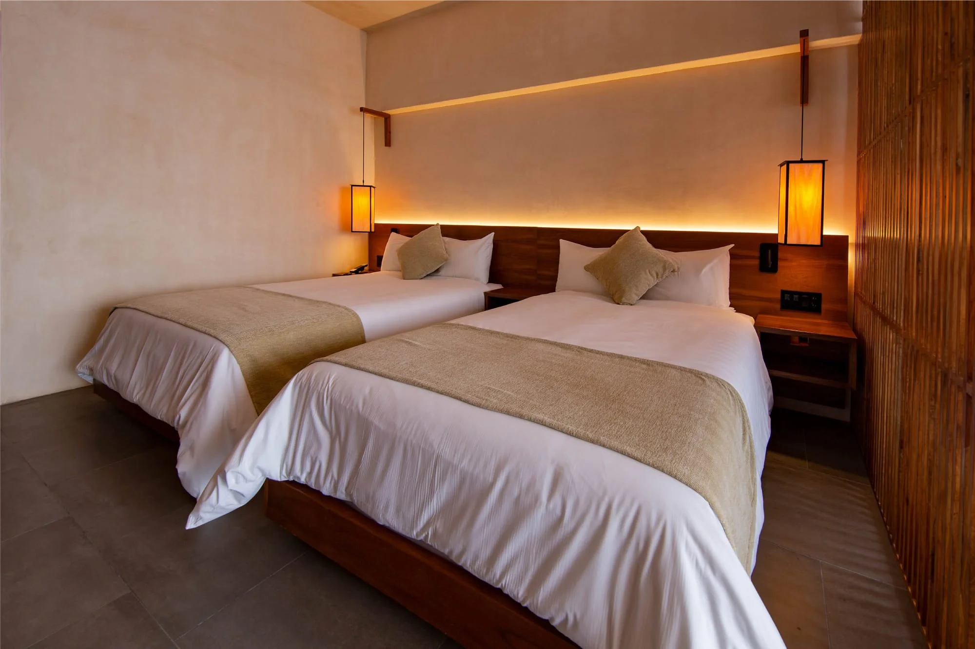 Habitación con dos camas en Hive Cancún